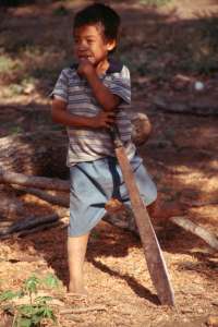Boy leaning on machete (1131.39 Kb)