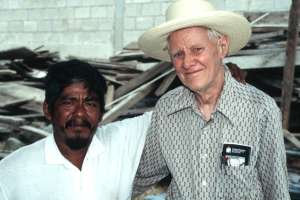 Refugee Don Nicolas with delegate Don Booth (1400.06 Kb)